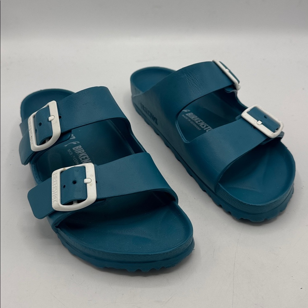 Birkenstock Two-Strap Teal Slide Sandals with White Buckles